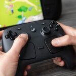 A Steam Controller, featuring its unique dual trackpads and ergonomic design, ready for gaming.