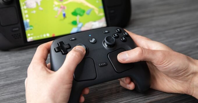 A Steam Controller, featuring its unique dual trackpads and ergonomic design, ready for gaming.