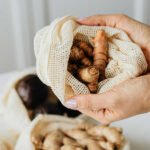 Golden turmeric powder and fresh turmeric root, symbolizing natural blood sugar control.