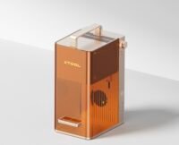 xTool F2 portable dual-laser engraver in action, engraving a material.