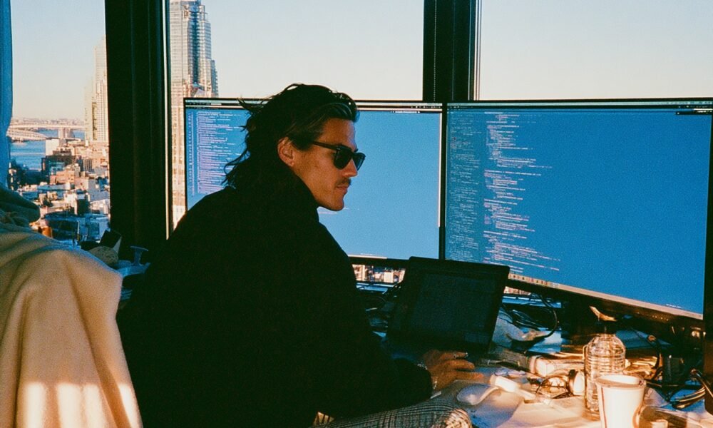 An entrepreneur contemplating the strategic use of AI to maintain a competitive edge.