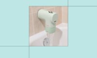 Canopy Bath Tub Filter attached to a faucet, filtering water for a cleaner bath experience.
