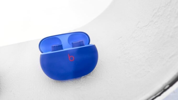 A pair of Beats Studio Buds earbuds, symbolizing the recent security update and patched vulnerability.