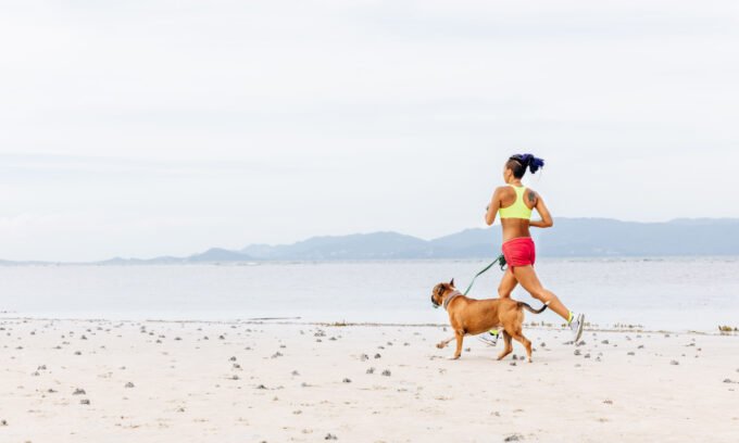 The Caffeine Conundrum: Is Your Morning Brew Actually Boosting Performance? 7 A steaming cup of coffee next to running shoes and fitness equipment, symbolizing pre-workout energy and athletic performance.