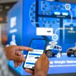 Carvana's innovative dealership interior, showcasing a test-drive area and interactive displays for new vehicle exploration.