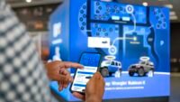 Carvana's innovative dealership interior, showcasing a test-drive area and interactive displays for new vehicle exploration.