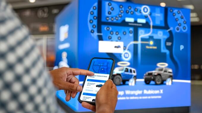 Carvana's innovative dealership interior, showcasing a test-drive area and interactive displays for new vehicle exploration.