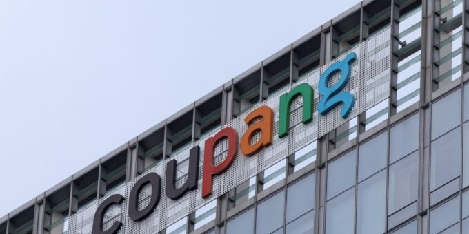 Coupang logo with South Korean flag background, symbolizing data breach fine