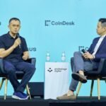 Changpeng Zhao (CZ) speaking at a cryptocurrency event, symbolizing his influence in the industry.
