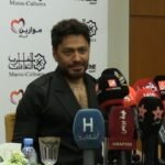 صورة للفنان تامر حسني يتحدث في ندوة صحفية بمهرجان موازين