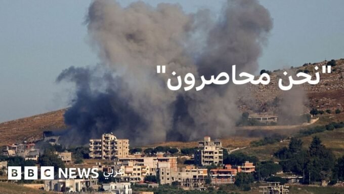 صورة جوية لقرية القليعة في جنوب لبنان تظهر طرقاً مغلقة ومنازل متضررة، تعكس واقع الحصار والصراع.