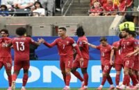 صورة لكريستيانو رونالدو يحتفل بهدف مع منتخب البرتغال في مباراة ضد أوزبكستان