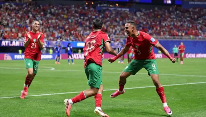 صورة تجمع بين علمي المغرب وهولندا مع شعار كأس العالم 2026
