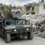 قوات من الجيش اللبناني تنتشر في جنوب لبنان، في سياق التوترات الإقليمية وتساؤلات حول الدعم الأمريكي.