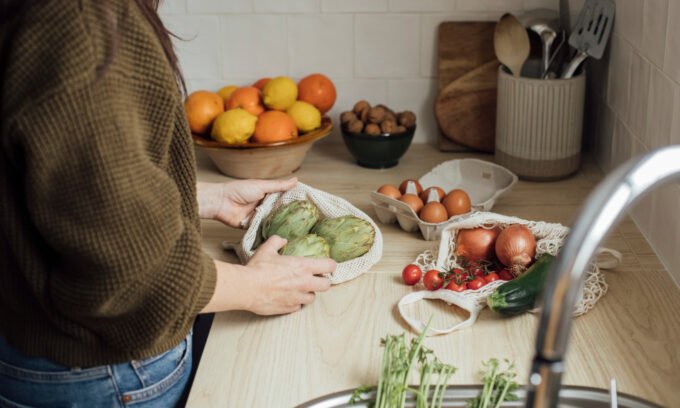A balanced plate featuring fruits, vegetables, whole grains, and lean protein, representing the core components of the DASH diet for managing high blood pressure.