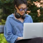 Dell XPS 13 laptop in sky and storm finishes, showcasing its thin and light design.