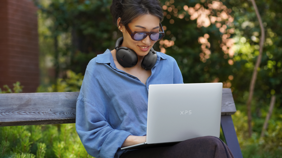 Dell XPS 13 laptop in sky and storm finishes, showcasing its thin and light design.