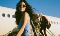 Young travelers exploring a vibrant European city street, embodying adventure and cultural immersion in their twenties.