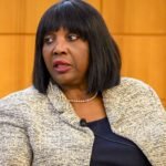 Federal Reserve Board Governor Lisa Cook speaking at an event.