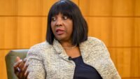 Federal Reserve Board Governor Lisa Cook speaking at an event.