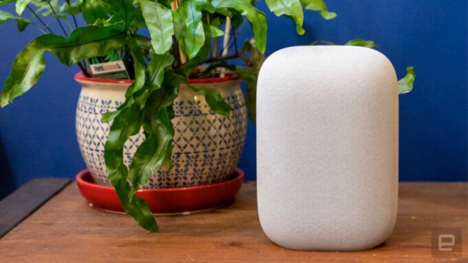 A Google Nest Home Mini and Nest Audio smart speaker side by side, symbolizing their discontinuation.