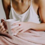 A steaming cup of green tea, symbolizing brain health and longevity benefits