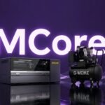 Gweike MCore dual-laser cutter processing metal and non-metal materials in a workshop setting