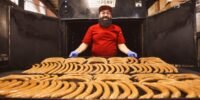 Salahodeen Abdul-Kafi, owner of Kafi BBQ, proudly stands with his halal Texas barbecue.