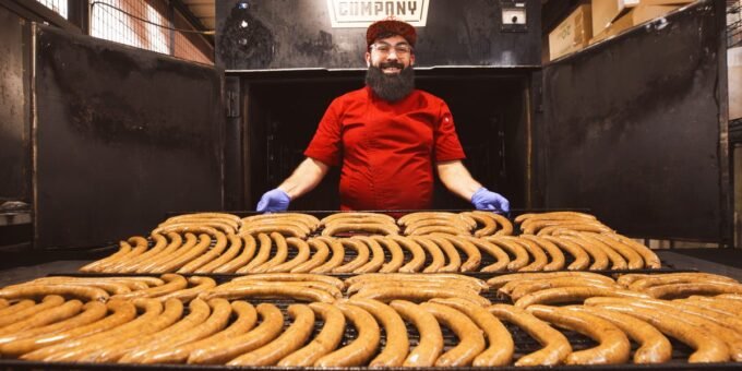Salahodeen Abdul-Kafi, owner of Kafi BBQ, proudly stands with his halal Texas barbecue.
