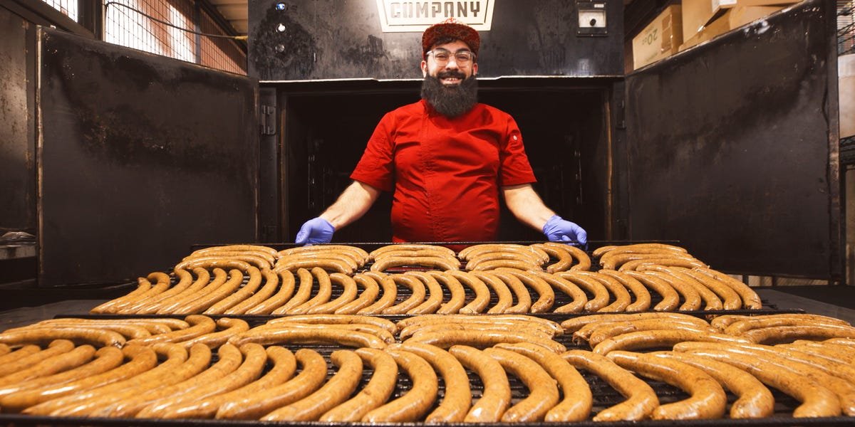 Salahodeen Abdul-Kafi, owner of Kafi BBQ, proudly stands with his halal Texas barbecue.