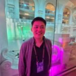 James Wo, CEO and founder of DFG, speaking at a crypto conference about crypto investments.