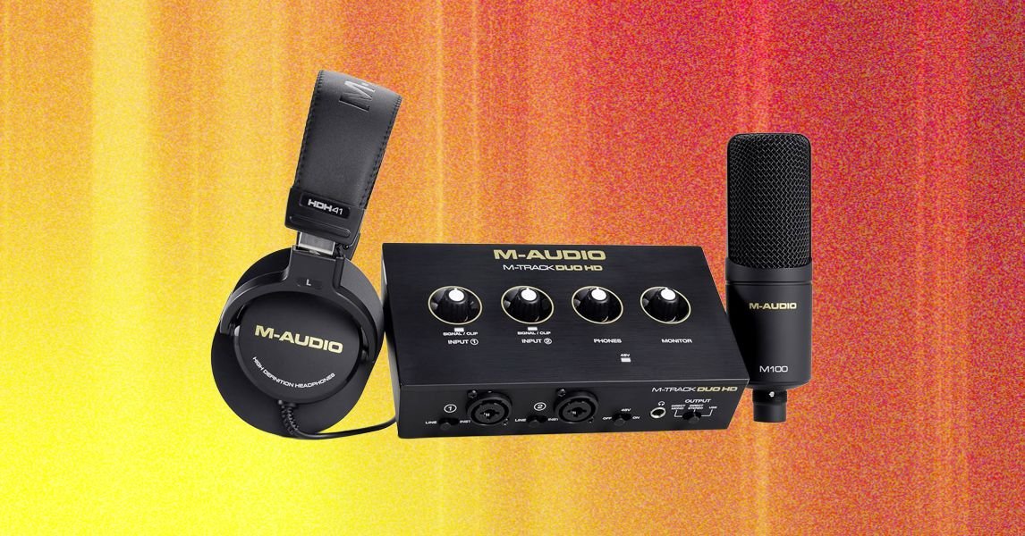 M-Audio M Track Duo HD Producer Pack including audio interface, condenser microphone, and headphones on a desk.