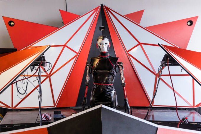 Global Call to Creators: Showcase Your Innovations at Fall Maker Faires 2026! 9 Diverse makers showcasing innovative projects at a bustling Maker Faire event, with various technologies and crafts on display.