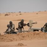 Soldats mauritaniens en mission de surveillance dans le sud-est du pays, près de la frontière malienne, symbolisant la vigilance du pays.