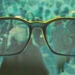 A pair of Meta Ray-Ban smart glasses with a digital overlay indicating facial recognition scanning a person's face.