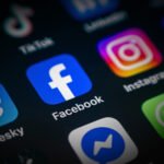 Meta Platforms logos for Facebook, Instagram, and WhatsApp experiencing a widespread outage