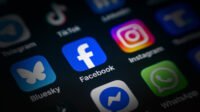 Meta Platforms logos for Facebook, Instagram, and WhatsApp experiencing a widespread outage