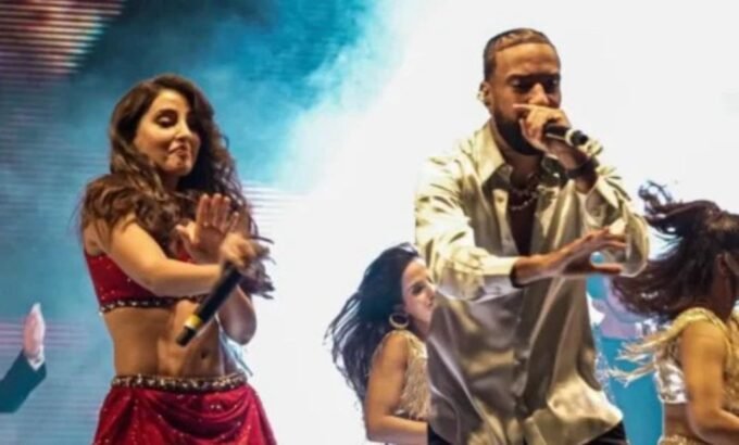 Mondial 2026 : Le Maroc Rayonne sur l'Album Officiel avec Nora Fatehi et French Montana 9 Nora Fatehi et French Montana, artistes d'origine marocaine, sur l'album officiel du Mondial 2026, symbolisant la fusion culturelle et sportive.