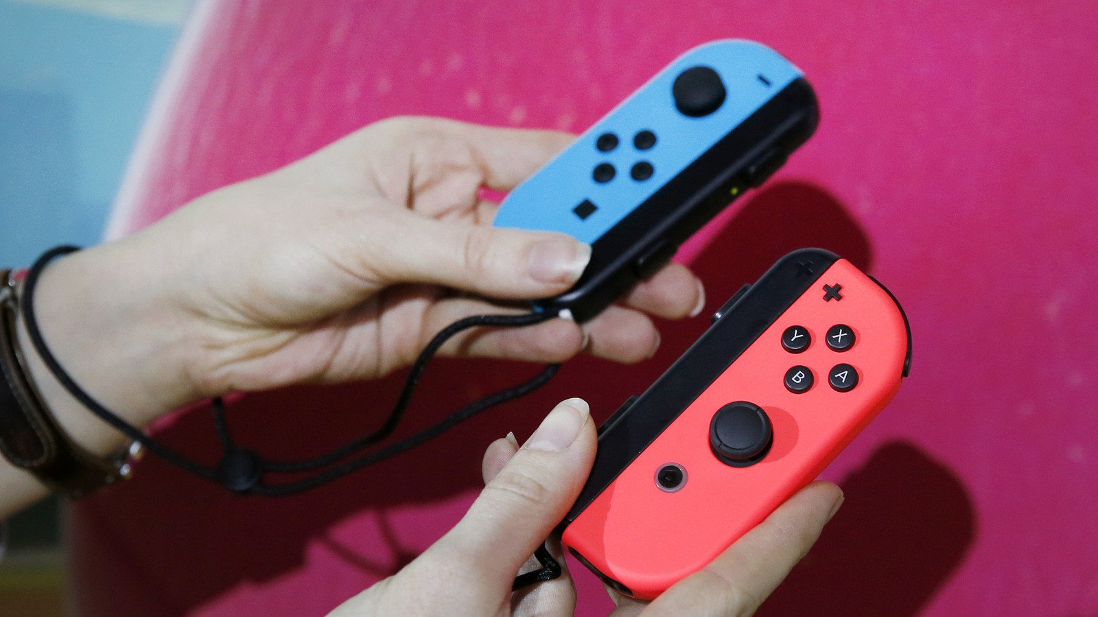 Nintendo Fined $40 Million in France Over Persistent Joy-Con 'Stick Drift' Deception 3 Close-up of a Nintendo Switch Joy-Con controller, highlighting the analog stick, symbolizing the 'stick drift' problem.