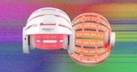 A person using a red-light therapy helmet for hair regrowth, illustrating modern hair restoration technology.