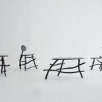 Uneri by Sotanaka furniture collection, crafted from natural tree branches, showcasing organic design in a serene setting.