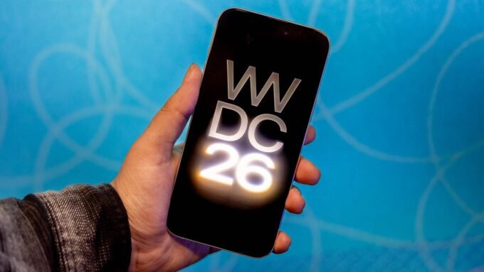 Apple WWDC 2026 keynote stage with AI graphics