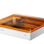 xTool M2 Color Craft Laser machine with a printed and cut plywood robot on its bed