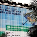 Abidjan : Ahmed Cissé s'empare d'une part majeure de la Bicici, un coup de maître pour la finance ivoirienne 8 Ahmed Cissé, dirigeant de Brandon & Mcain Capital, souriant lors d'un événement financier à Abidjan.