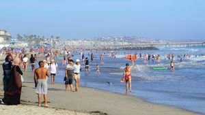 Scenic view of a pristine, affordable U.S. beach with clear water and white sand