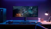 Alienware 34-inch curved ultrawide gaming monitor displaying a vibrant game scene.