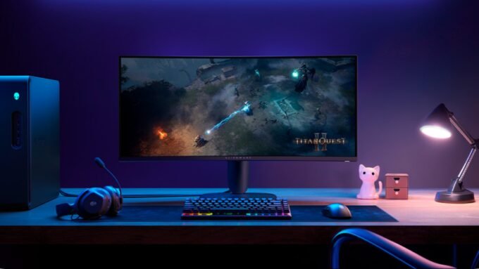 Alienware 34-inch curved ultrawide gaming monitor displaying a vibrant game scene.