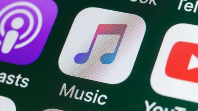 Apple Music Hikes Prices: One Subscription Plan Remains Untouched Amidst Rising Costs 9 Apple Music logo with a dollar sign overlay, symbolizing price increase
