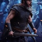 Une scène du film L'Odyssée de Christopher Nolan, montrant Matt Damon dans un paysage mythologique, soulignant l'ampleur visuelle de la production IMAX.