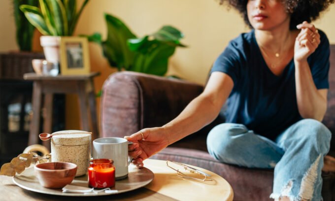 A steaming cup of coffee or tea, symbolizing daily health and longevity benefits.